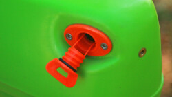 The Drain Plug has a T-shaped end to prevent it from falling out. We don't recommend leaving it hanging out like this or else it can get broken. Drain Plug