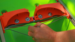 Our footrests run along an aluminium rail with sprung pins to hold them in place. They can be easily adjusted for paddlers of different height. Pull the cords to release the spring-loaded pins, push or pull the footrests and then allow the pins to click into holes again. Position the footrests so that your knees are slightly bent. Footrest system