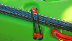 The paddle shaft lies in in a groove and is secured by 5mm bungee cord that uses our Bungee Hook to secure the shaft in place. Paddle Rest